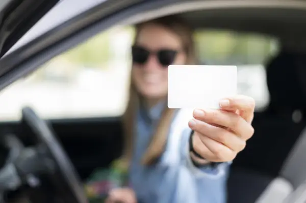woman holding credit card min